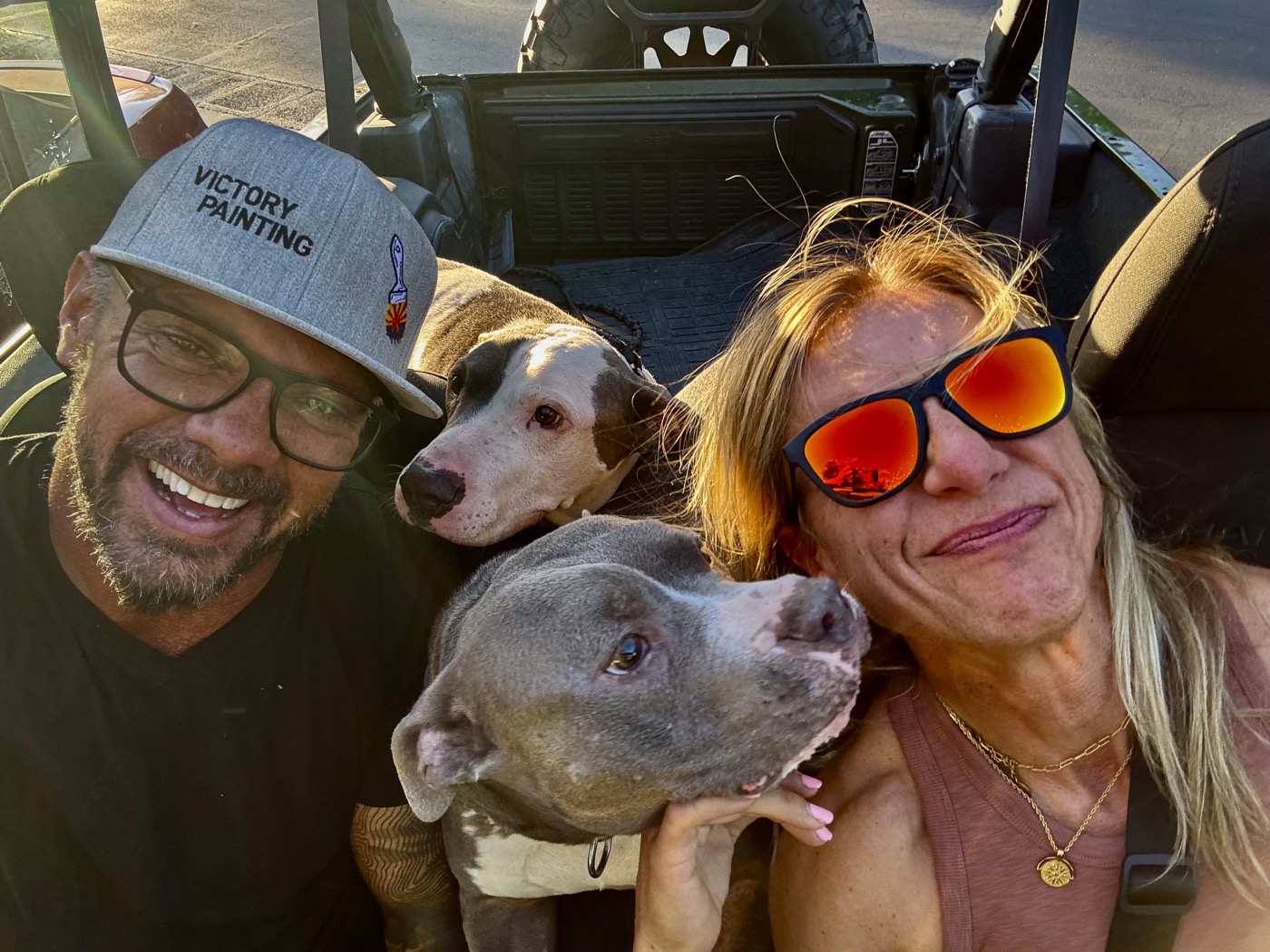 Vic Newman, his wife Kara, and their rescue dogs
