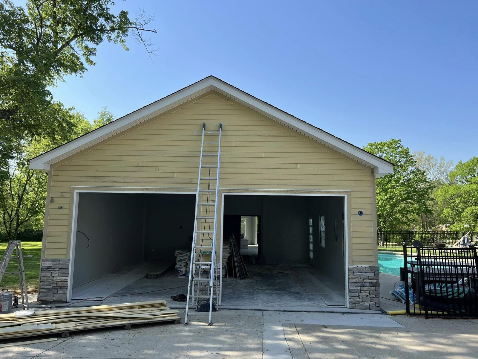 Ladder set up on an exterior repaint by Victory Painting