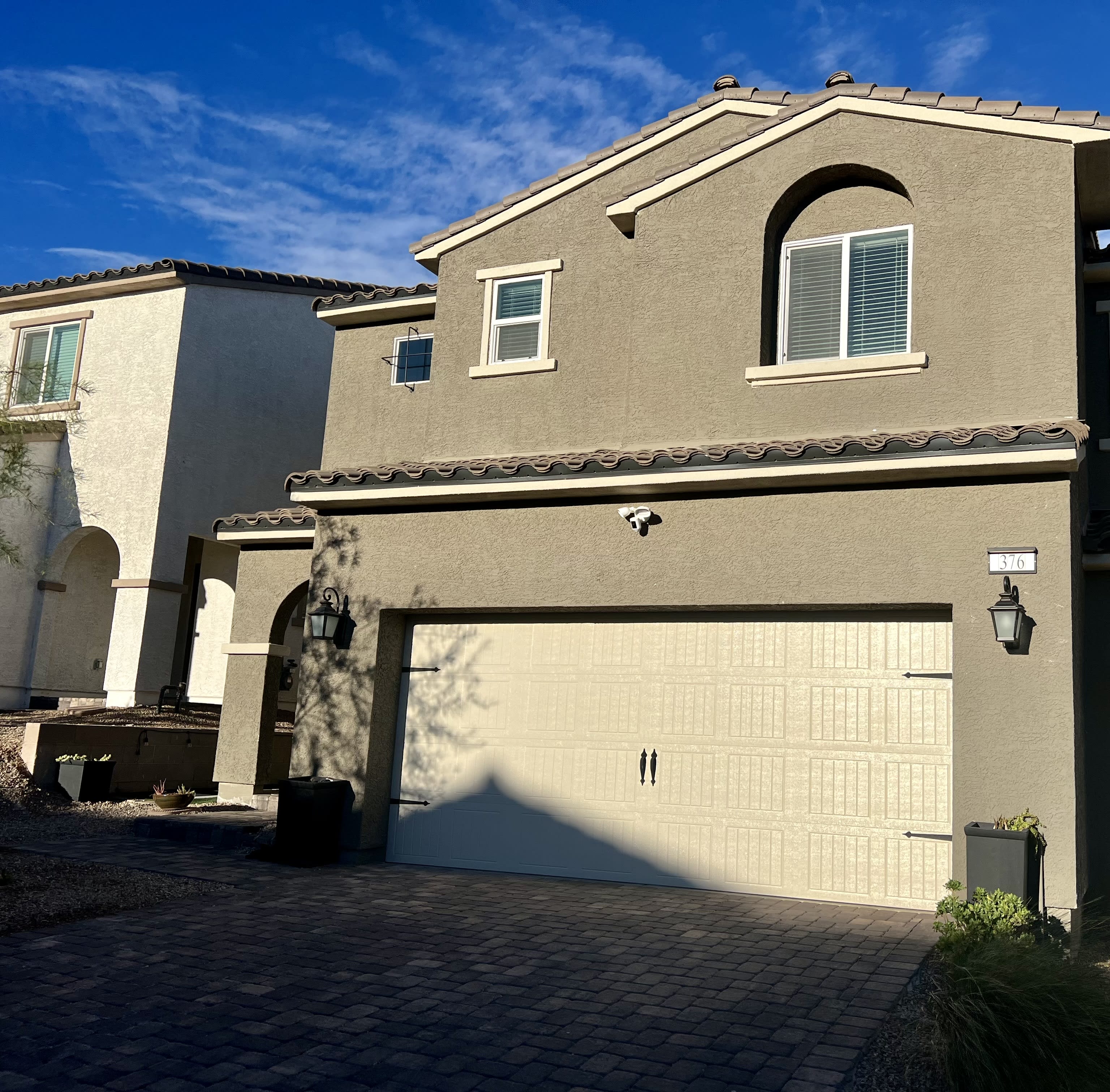Stucco home with arches