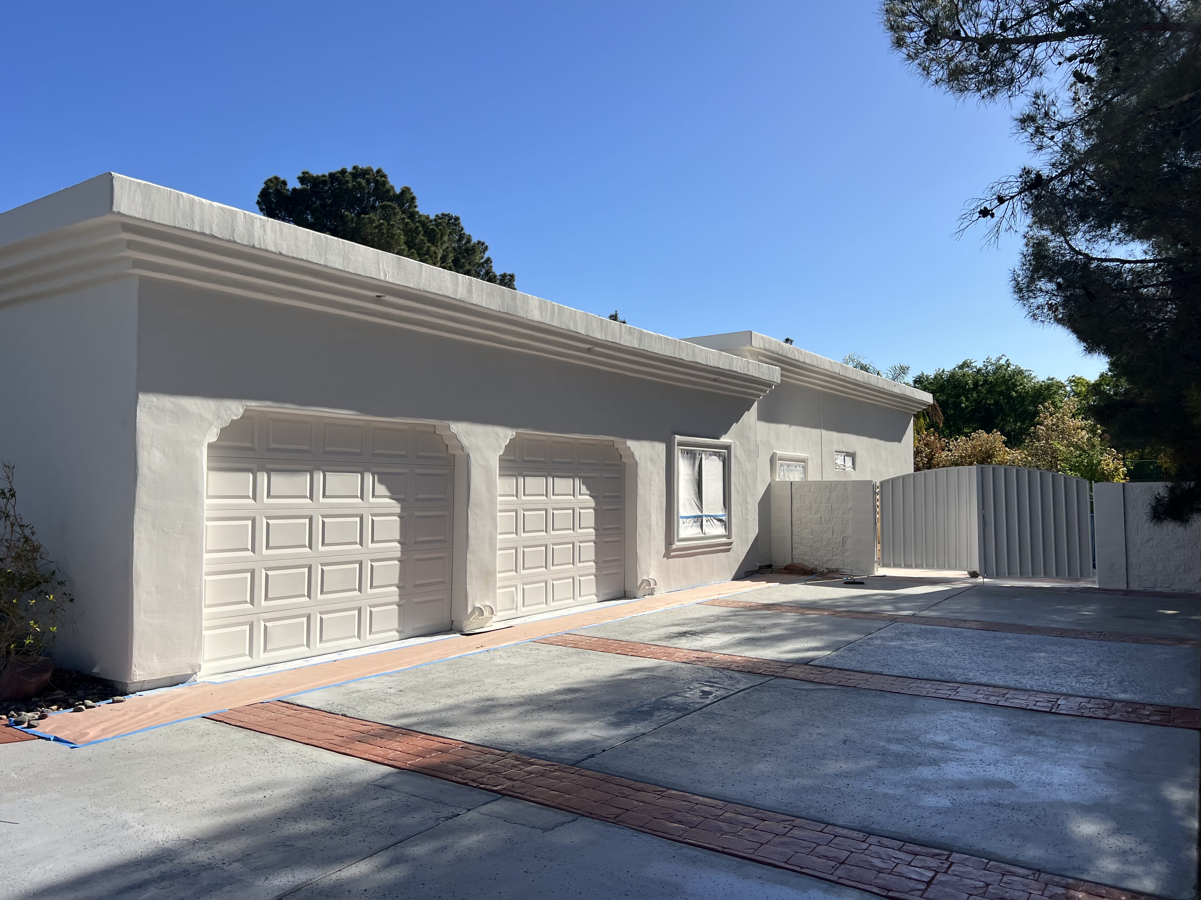 White stucco home with tile roof